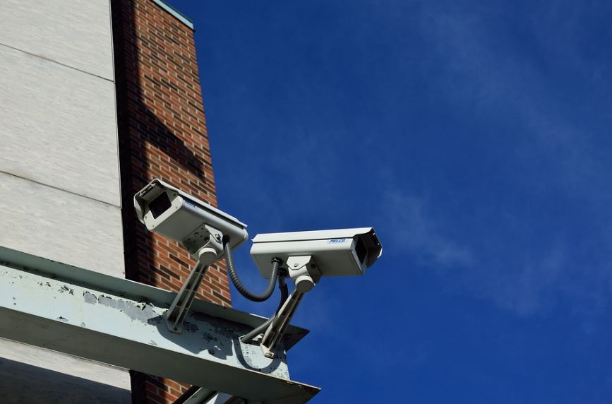 An image showing security cameras installed on a building